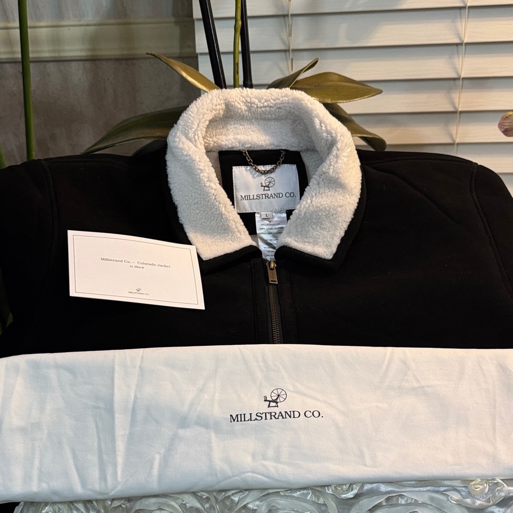 Millstrand Co. Black Lamb Skin Jacket with White Collar
